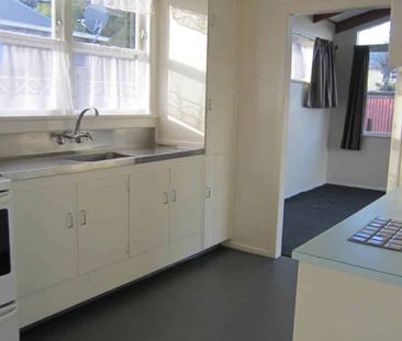 NEAT AND TIDY 4 BEDROOM HOME - Photo 1