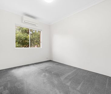 Dual level townhome in a quiet location- close to buses, park and l... - Photo 6