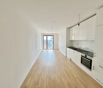 moderne 2-Zimmer Wohnung im 18.OG nächst Hauptbahnhof (Dachterrasse, Co-Working Bereich & Gym inklusive) - Photo 1