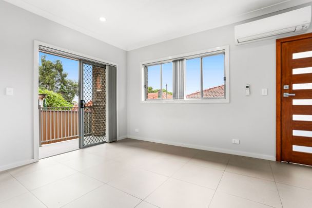 Modern Two Bedroom Home- North Facing Courtyard! - Photo 1
