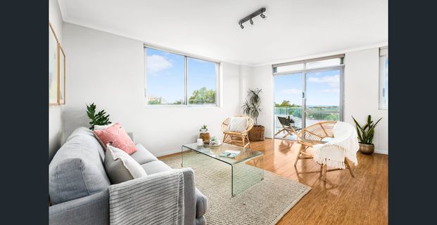 Sunny entertainer in the perfect lifestyle location - Photo 1