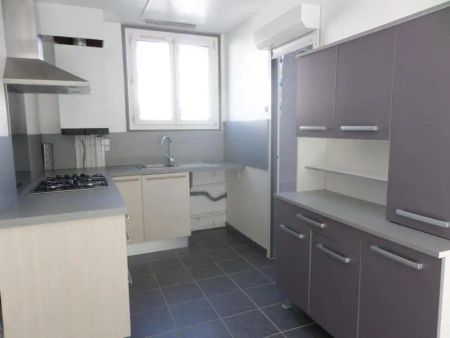 Appartement à louer 4 pièces 64m² - Photo 2