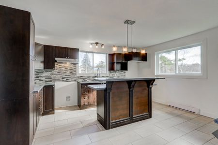 Maison de plain-pied à Saint-Jérôme - Photo 3