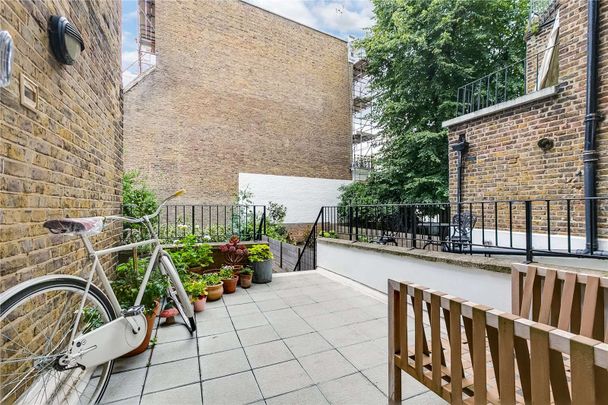 A spacious three bedroom apartment with private patio garden. - Photo 1