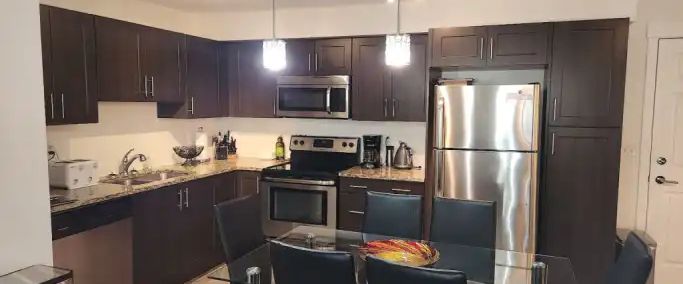 SE LIVING AT ITS FINEST! 2 BED/2 BATH/2 PARKING STALLS! CONVENIENT LOOCATION! | 755 Copperpond Blvd SE, Calgary - Photo 1