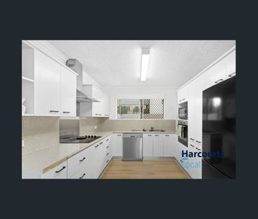 Ground Level Gem with Dual Courtyards in Prime Clayfield Location - Photo 4