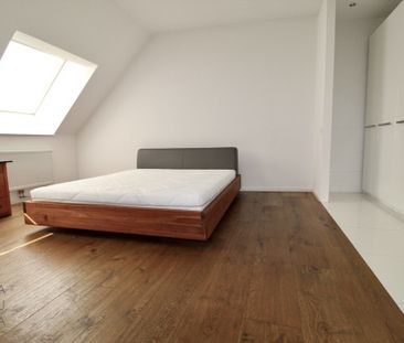 Gemütliche Dachgeschosswohnung mit atemberaubender Dachterrasse! - Foto 4