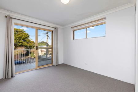 Inner-City Convenience with Spacious Living & Balcony Retreat - Photo 4