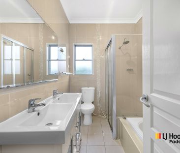 Contemporary Family Living in a Spacious Double-Brick Home - Photo 6