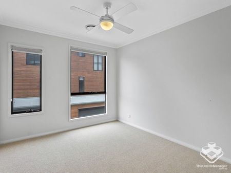 Stylish 4-Bedroom Townhome with Premium Features - Photo 2