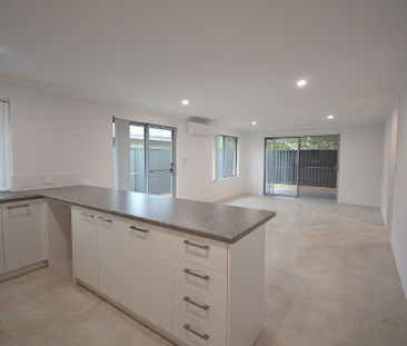 AMAZING, LOW MAINTENANCE 4x2x2 FAMILY HOME - Photo 1