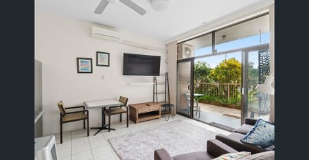 Furnished 1-Bedroom Apartment with Pool & Beachside Convenience - Photo 2