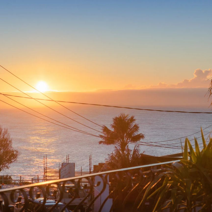 Unsurpassed family lifestyle with ocean views in a coveted headland cul-de-sac - Photo 1