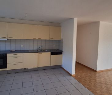 Appartement de 2,5 pièces au rez-de-chaussée - Photo 2
