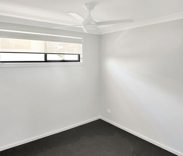 SPACIOUS THREE-BEDROOM HOME WITH ENSUITE, DOUBLE GARAGE & ENCLOSED ... - Photo 2