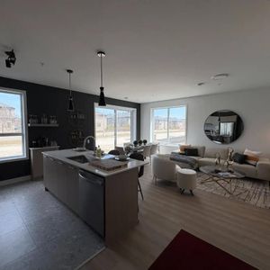 Appartement 4 1/2 lumineux et spacieux dans un nouveau quartier - Photo 2
