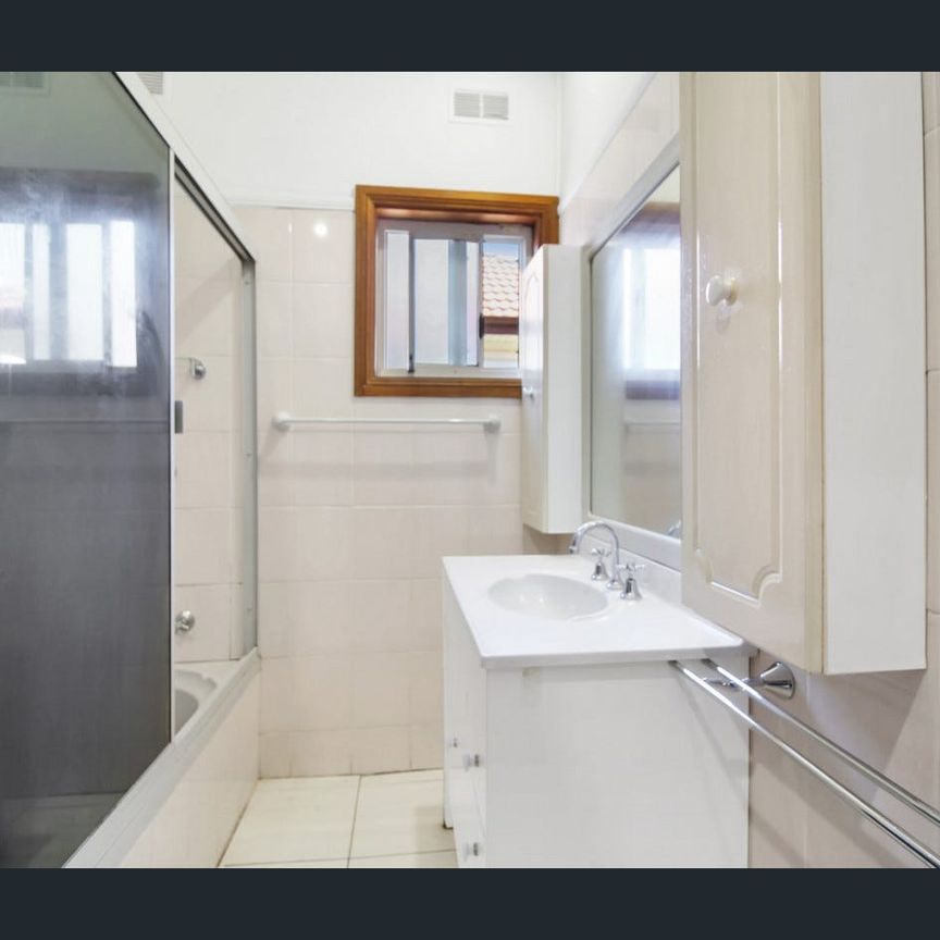 Charming Port Kembla Home with Spacious Living and Expansive Yard - Photo 1