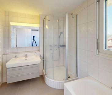 4.5 room attic apartment with large terrace - Photo 6