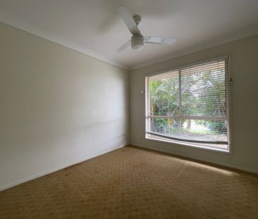 Modern 3 Bedroom Home with Spacious Yard - Photo 4