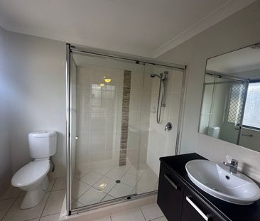 Comfortable and Convenient 4-Bedroom Family Home - Photo 2