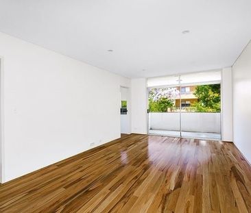 Beautifully Renovated Two Bedroom Unit - Photo 2