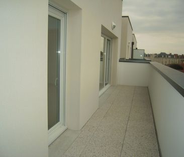 Appartement RUE DE VERDUN - Photo 2