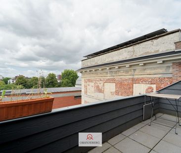 Centraal gelegen 2 slaapkamer-appartement met zicht op de Coupure! - Foto 1