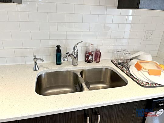 10799 Cityscape Drive NE | Townhouse | 3-bedroom, 2.5-bathroom | Double Garage - Photo 1