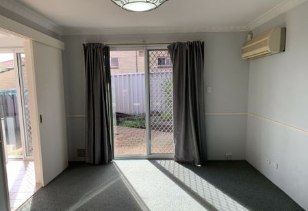 Townhouse Living in a Secure Complex - Photo 2