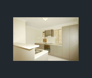 This lovely 4 bedroom home is VERY SPACIOUS & ROOMY, modern & in a ... - Photo 5