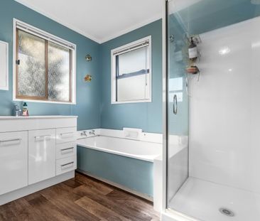 This spacious 4-bedroom, 2-bathroom home is located in the heart of... - Photo 6