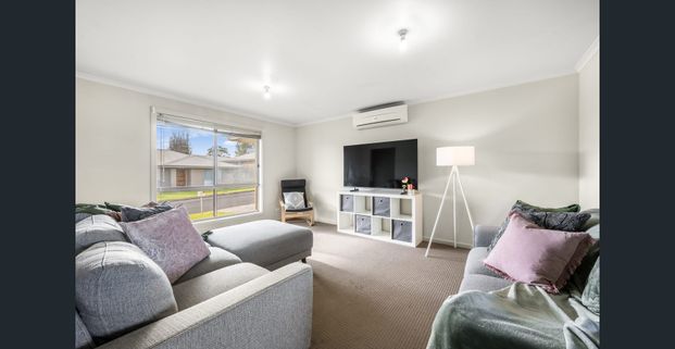 Well Located Unit with Everyday Convenience - Photo 1