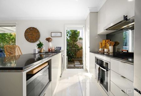 Modern townhome living with fresh upgrades - Photo 2