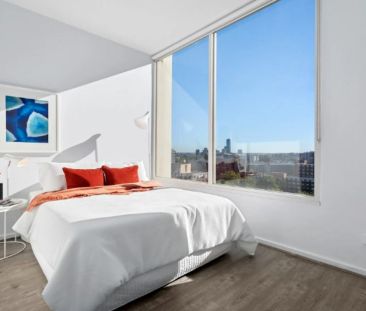 Light-Filled Corner Apartment with Sweeping City Views - Photo 1