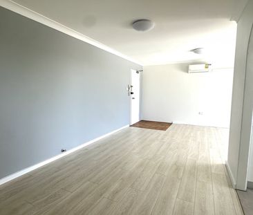 FULLY RENOVATED FLOOR 2 BEDROOM UNIT 500M TO AUBURN STATION - Photo 4