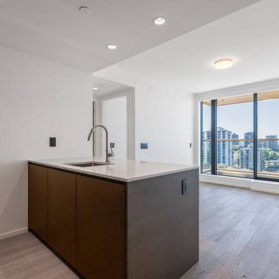 ***Brand New 1 bed+Den luxury apartment in downtown core - Photo 1