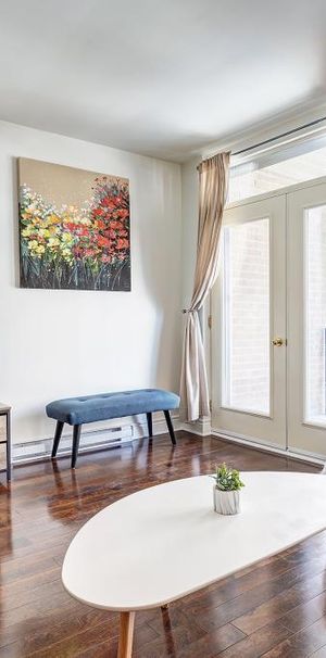 Très beau condo, 2 chambres, idéalement situé sur le plateau. - Photo 1