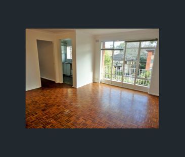 Bright & Sunny One-Bedroom Security Apartment with Brand New Bathroom - Photo 1