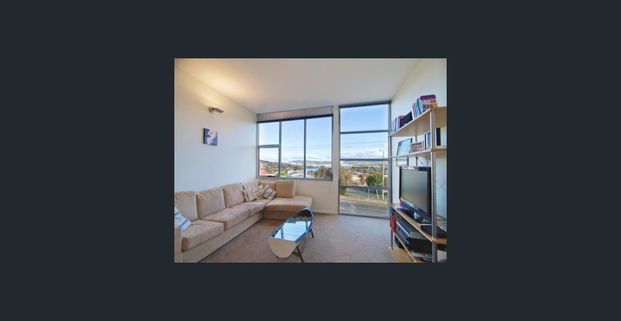 Stylish and Spacious 2-Bedroom Townhouse with Stunning Views -includes power - Photo 1