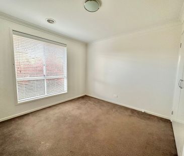 Modern Four Bedroom Home in a Desirable Location! - Photo 1