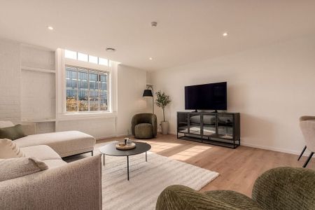 NEW 3BR Executive Furnished Apartment with Garage - Photo 2