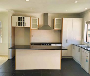 Brick & Tile Comfort in a Handy Location - Photo 4