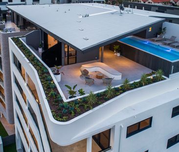 Designer style and luxury living with a rooftop pool - Photo 4