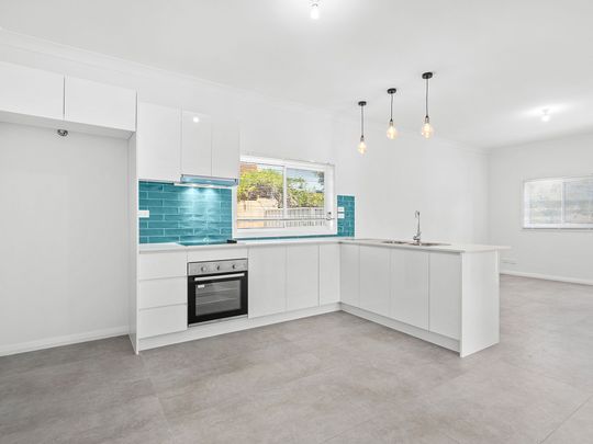 STYLISH RENOVATED HOME IN A PRIME LOCATION - Photo 1