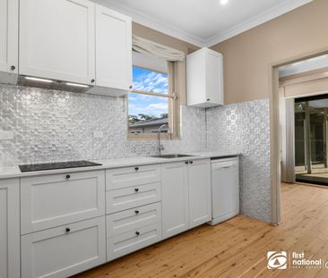 Renovated Family Living with Exceptional Garaging - Photo 4