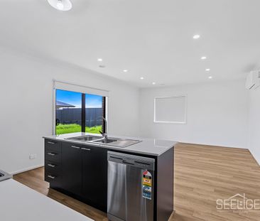 Brand New Family Home with Modern Comforts & Secure Living - Photo 2