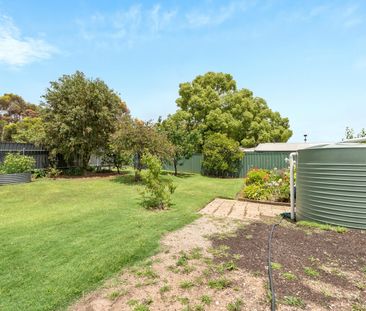Three-Bedroom Home with Multiple Living Areas Near Modbury Hospital! - Photo 3