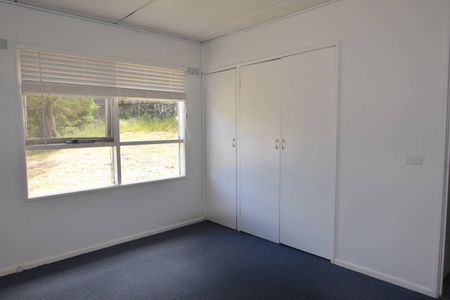 Fully Furnished Charming 3-Bedroom Home with Carport - Photo 4