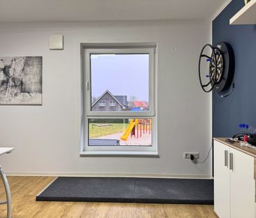 Einziehen & wohlfühlen: Doppelhaushälfte mit EBK, Südterrasse und C... - Photo 2