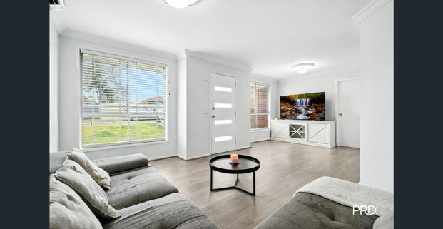 Modern Family Home with Multiple Living Areas - Photo 1